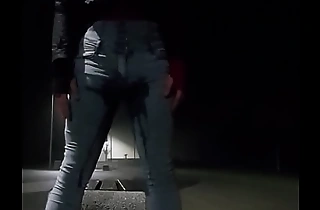 open-air pee in jeans