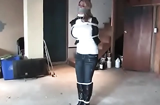 Carissa bound and gagged in boots