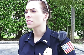Female cops captivate over black suspect and suck his cock