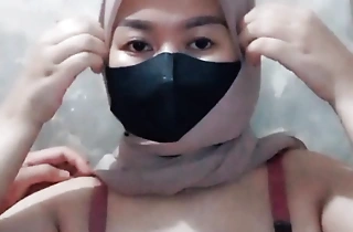 Horny Indonesian hijab asks in be fucked