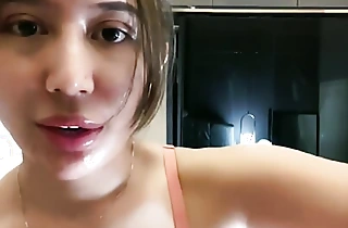 Cute indonesian girl exposing her wet vagina under X-rated lingerie