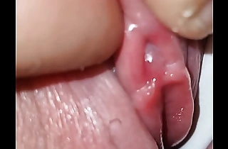 Hiden behind her gorgeous cameltoe I found her tiny love button I play nigh till she cums