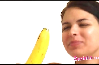 How-to: youthful brunette bird teaches using a banana
